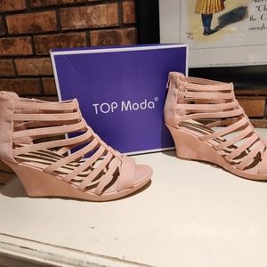 Blush color strappy, zip-up wedge heels. 10M. Never worn.